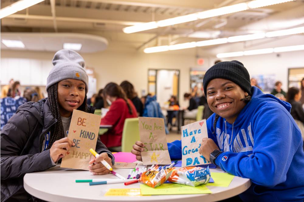 student volunteers for kids food basket